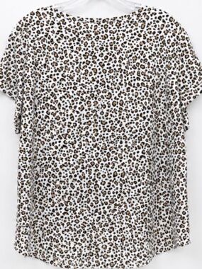 Chris & Carol top featuring a black and brown leopard print.